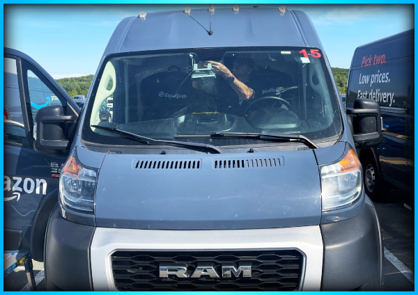 Amazon delivery van with broken windshield